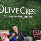 Image: Jon Dietz visits Olive Crest with a generous holiday donation