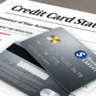 a credit card statement with cards laying on top