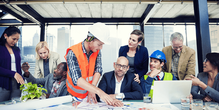 a variety of different business owners sitting around a conference table